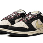 Tênis Nike Dunk Low "Black Team Gold" Preto / Dourado